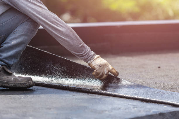 Professional Basement Waterproofing technician working in McLean, VA